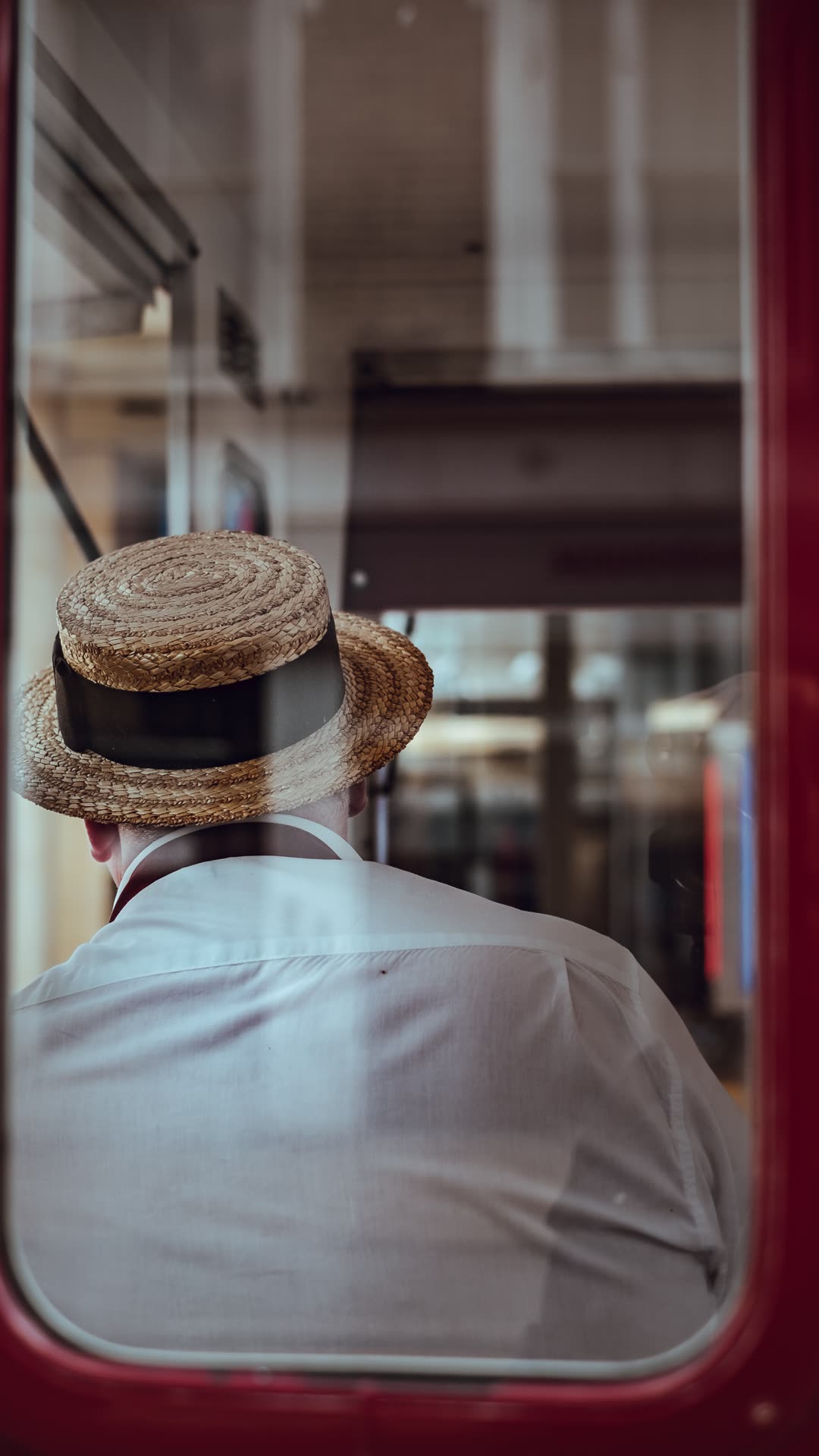 Person taking a short screen break near a window